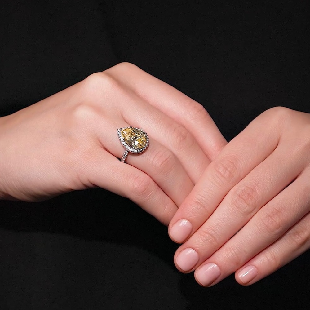 Silver ring with yellow CZ